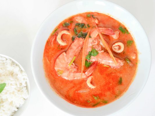 Image of Seafood Tom Yam Soup served with rice prepared by home chef