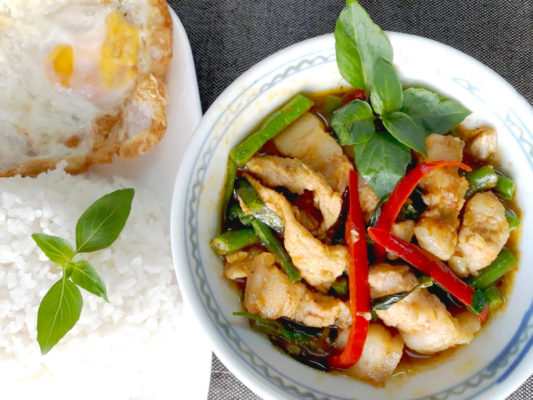 Image of spicy Thai Style Stir Fried Pork with long bean and chilli served with rice prepared by home chef