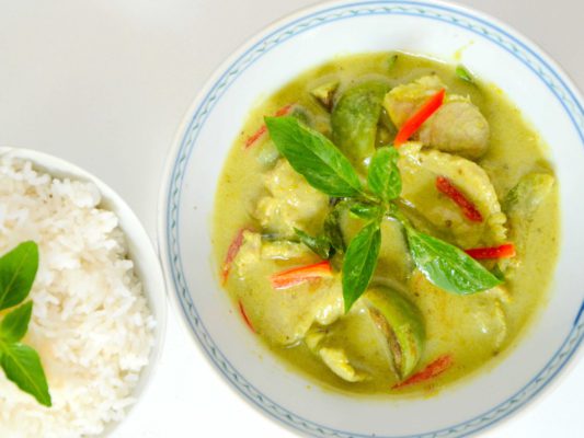 Image of zesty Thai Style Green Curry pork served with rice freshly prepared by home chef